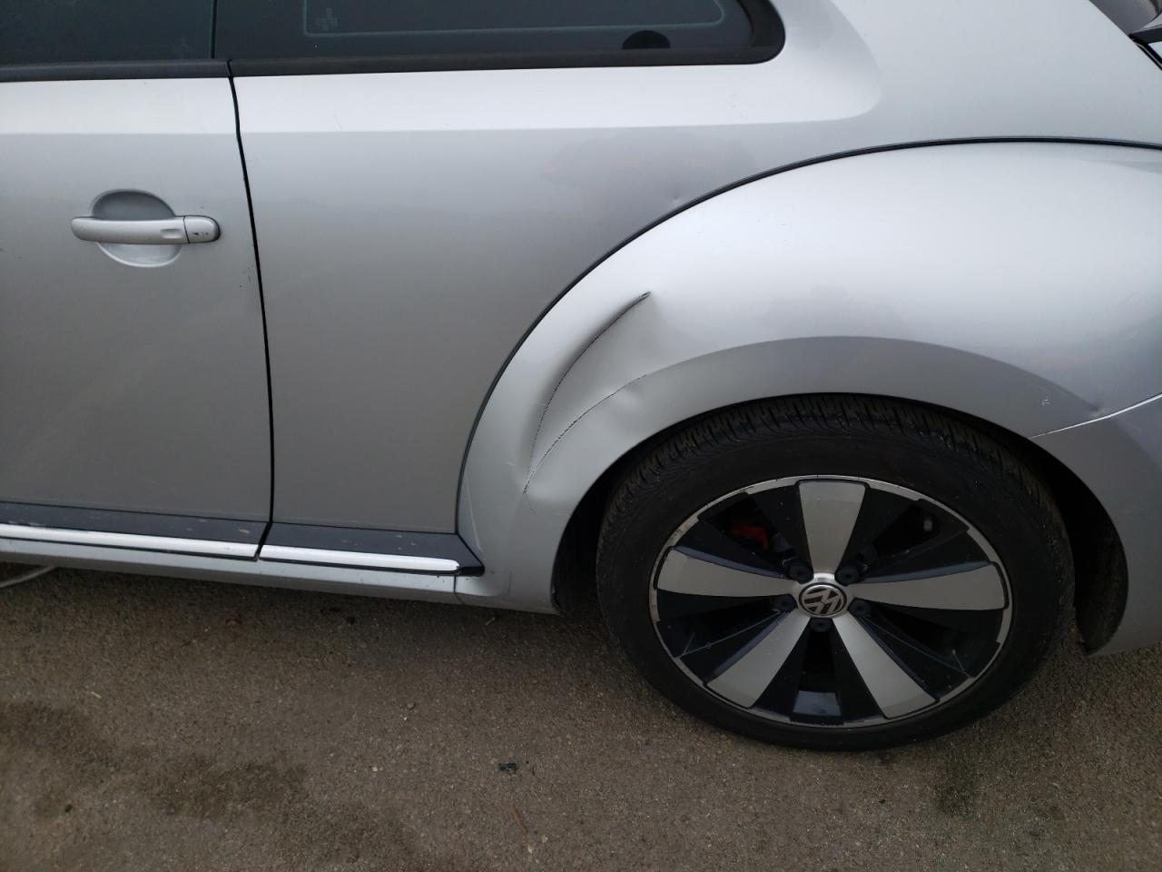 Photo 9 from auction – 2012 VOLKSWAGEN BEETLE TUR with VIN 3VWVA7AT7CM610450