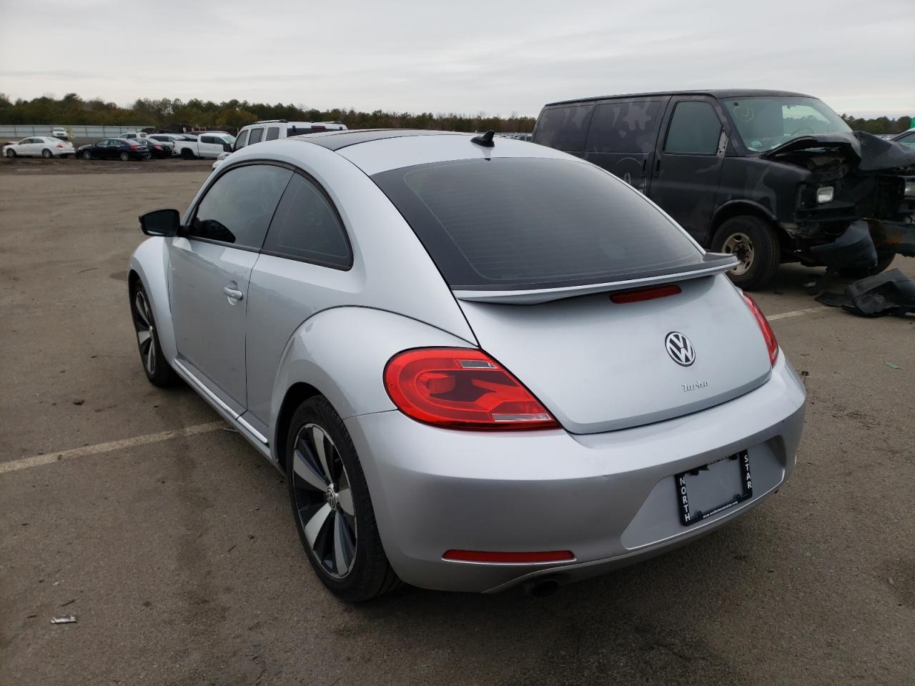 Photo 3 from auction – 2012 VOLKSWAGEN BEETLE TUR with VIN 3VWVA7AT7CM610450