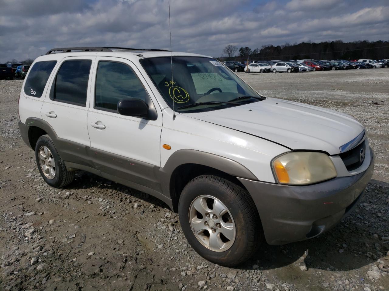 MAZDA TRIBUTE LX 2001 with VIN 4F2YU09101KM38963 - Photo from auction