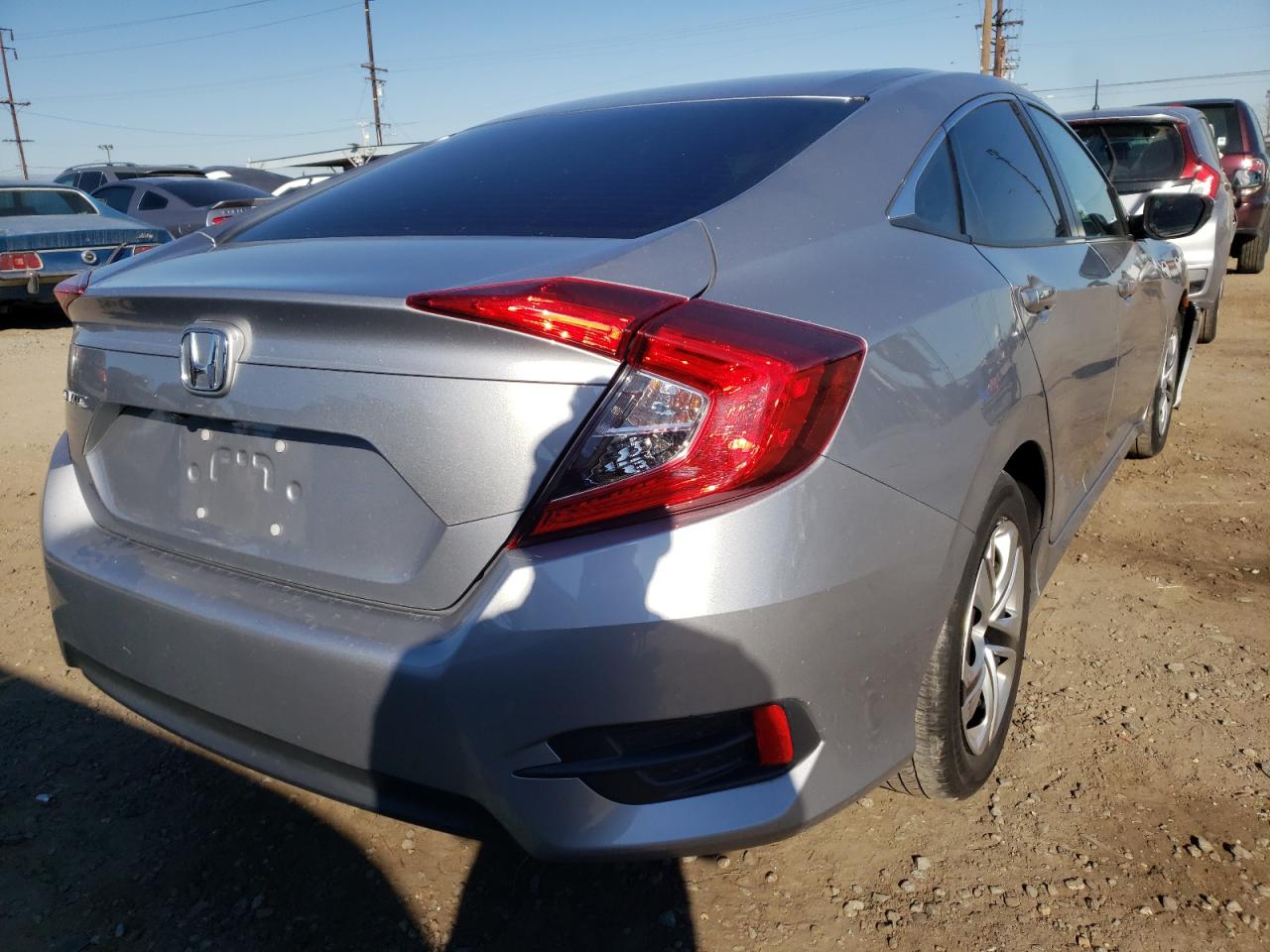 Photo 4 from auction – 2018 HONDA CIVIC LX with VIN 2HGFC2F59JH506960
