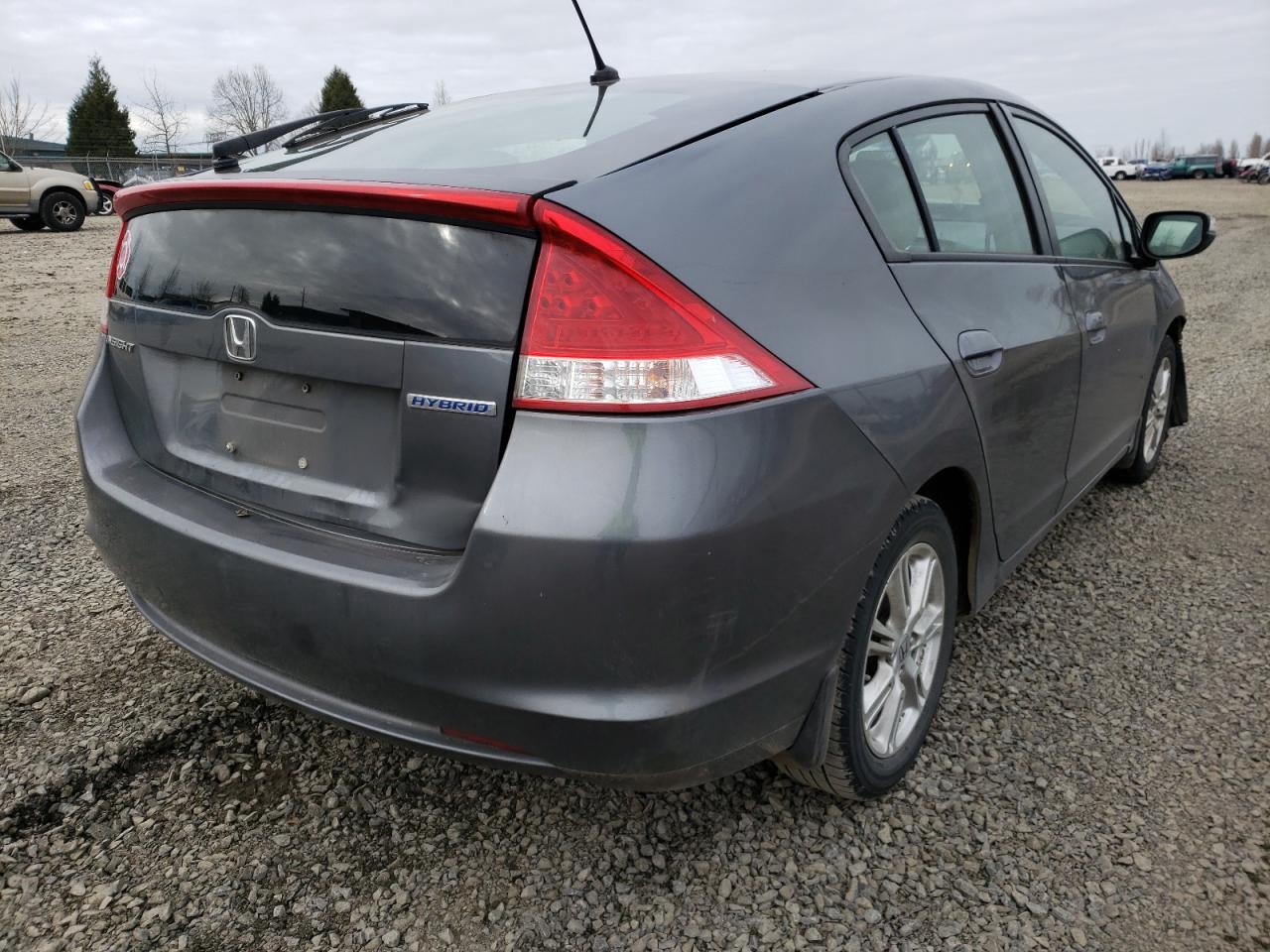 Photo 4 from auction – 2011 HONDA INSIGHT EX with VIN JHMZE2H75BS011796