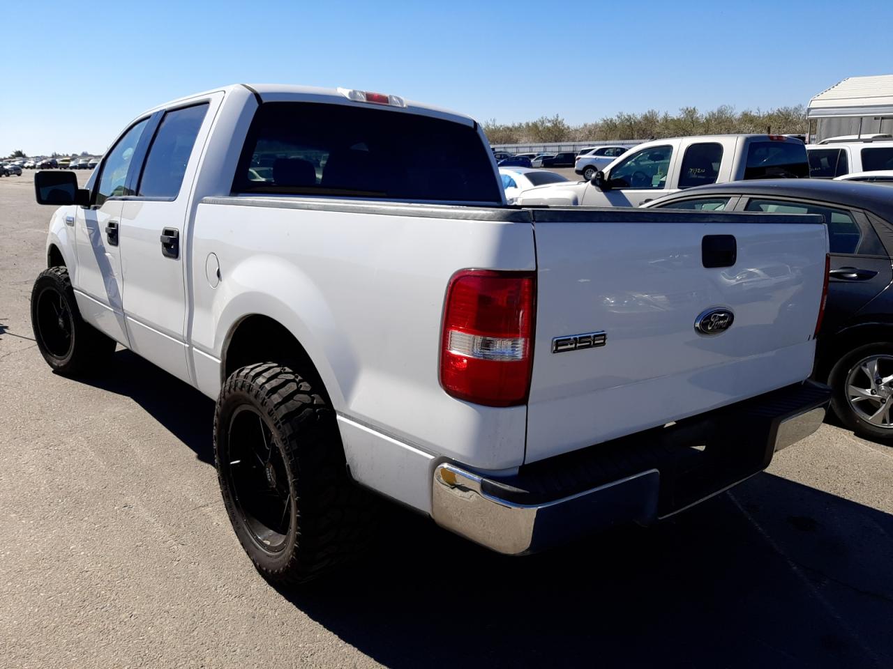 Photo 3 from auction – 2004 FORD F150 SUPER with VIN 1FTRW12W14KC61175
