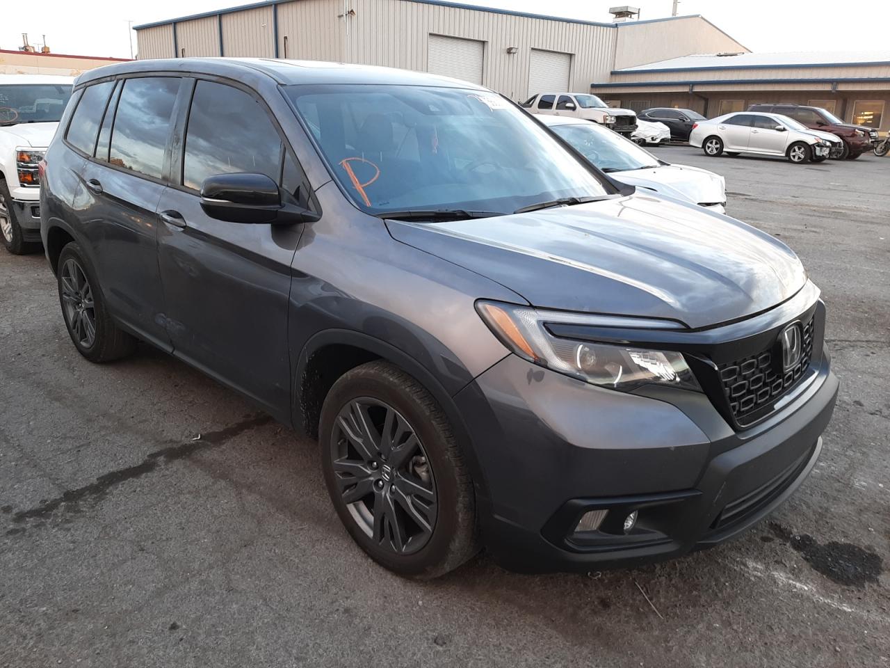 HONDA PASSPORT E 2021 with VIN 5FNYF7H5XMB001965 - Photo from auction