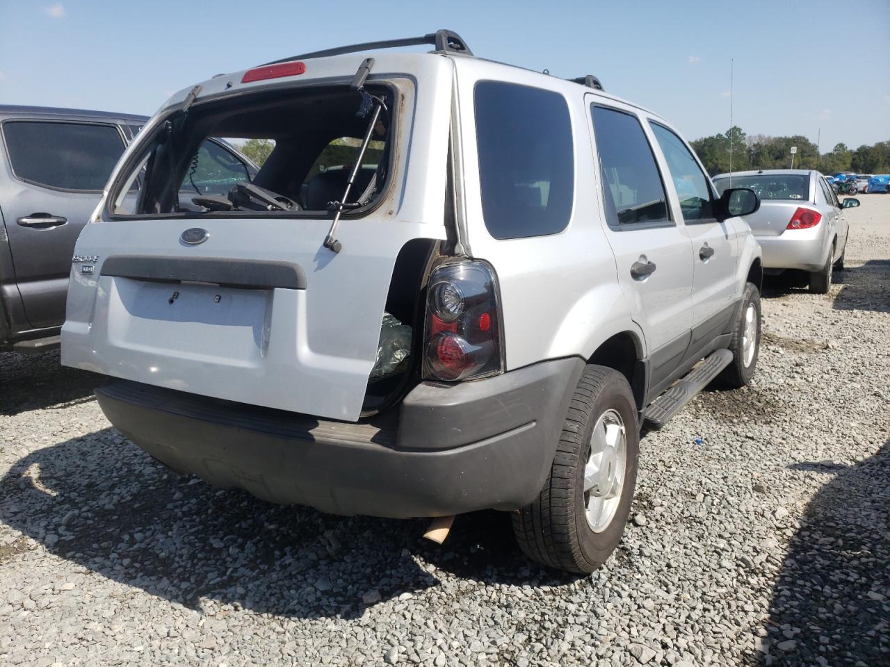 Photo 4 from auction – 2002 FORD ESCAPE with VIN 1FMYU01B12KB76808