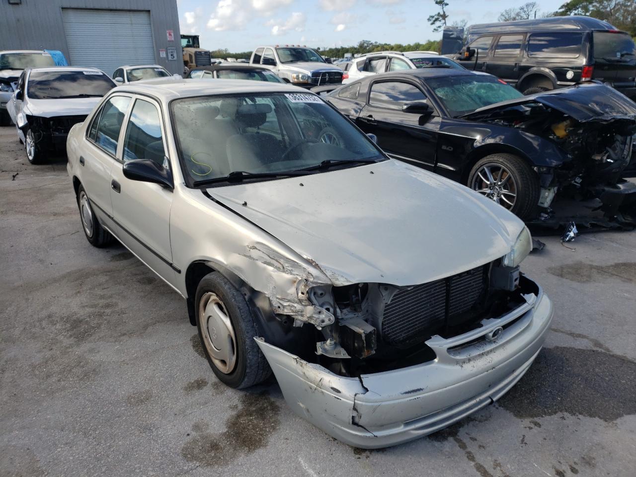 TOYOTA COROLLA VE 2000 with VIN 1NXBR12E7YZ306884 - Photo from auction