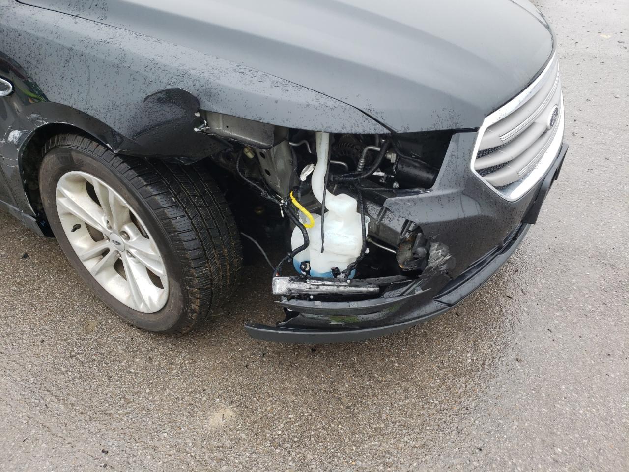 Photo 9 from auction – 2014 FORD TAURUS SEL with VIN 1FAHP2H89EG117309