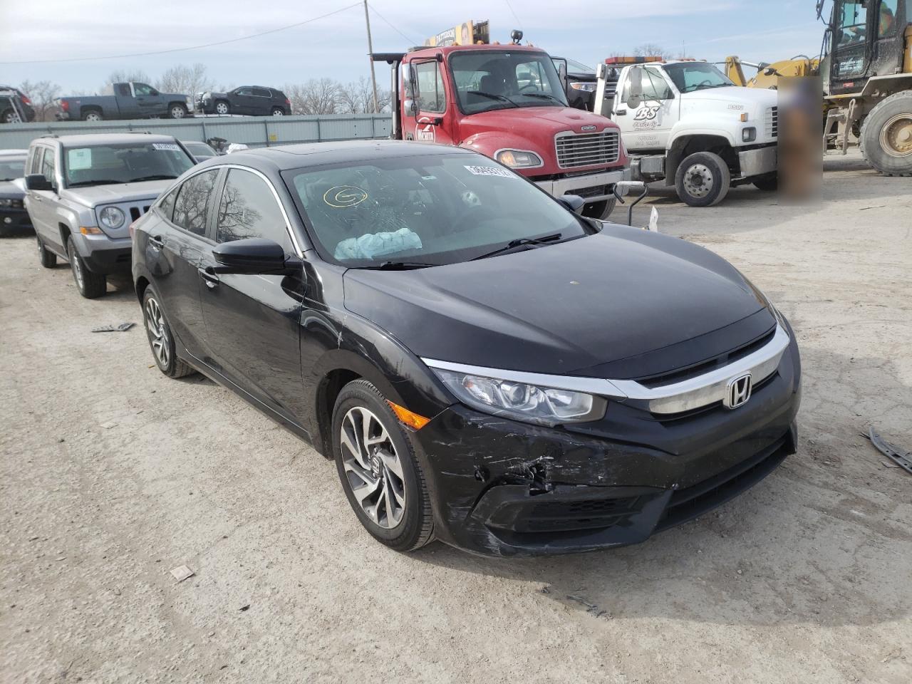 HONDA CIVIC EX 2018 with VIN 2HGFC2F72JH548971 - Photo from auction