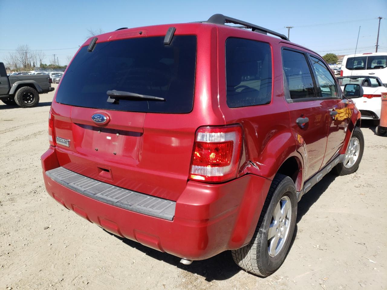 Photo 4 from auction – 2010 FORD ESCAPE XLS with VIN 1FMCU0C70AKD34895