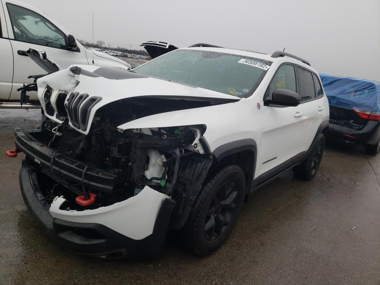 Photo 2 from auction – 2014 JEEP CHEROKEE T with VIN 1C4PJMBB9EW255834
