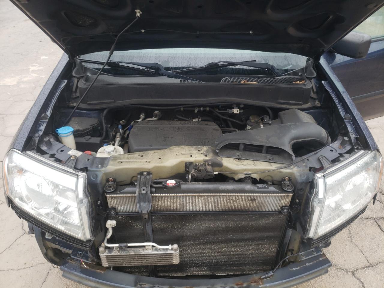 Photo 7 from auction – 2011 HONDA PILOT LX with VIN 5FNYF4H2XBB103512