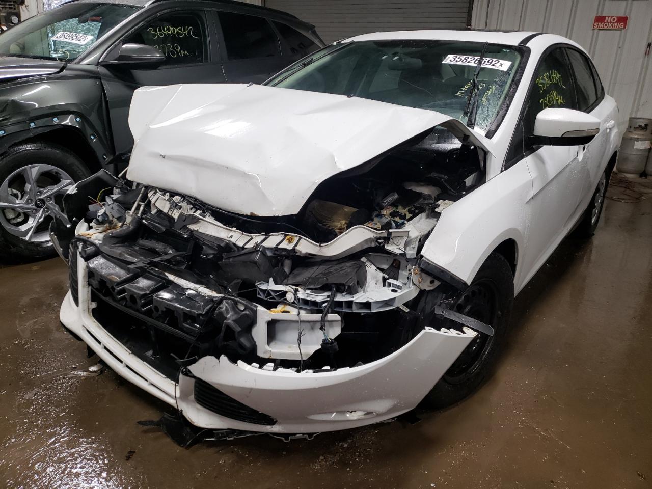 Photo 2 from auction – 2013 FORD FOCUS SE with VIN 1FADP3F27DL337301