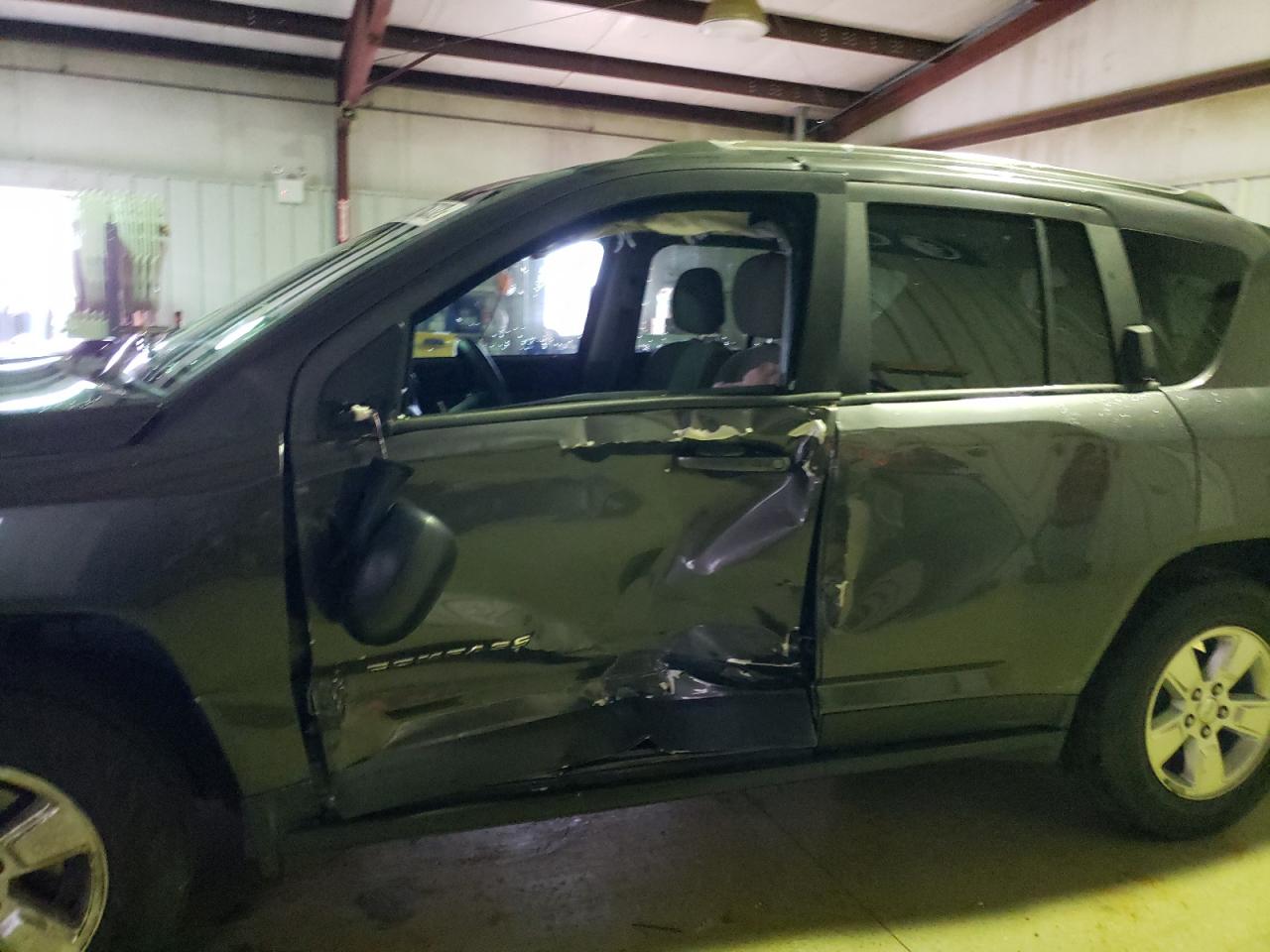 Photo 9 from auction – 2014 JEEP COMPASS SP with VIN 1C4NJCBA8ED832471