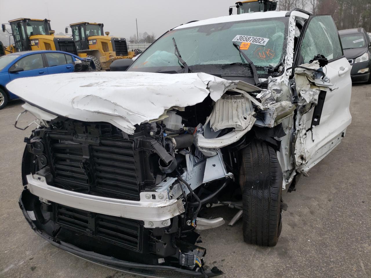Photo 9 from auction – 2021 FORD EXPLORER X with VIN 1FMSK7DH3MGB67117