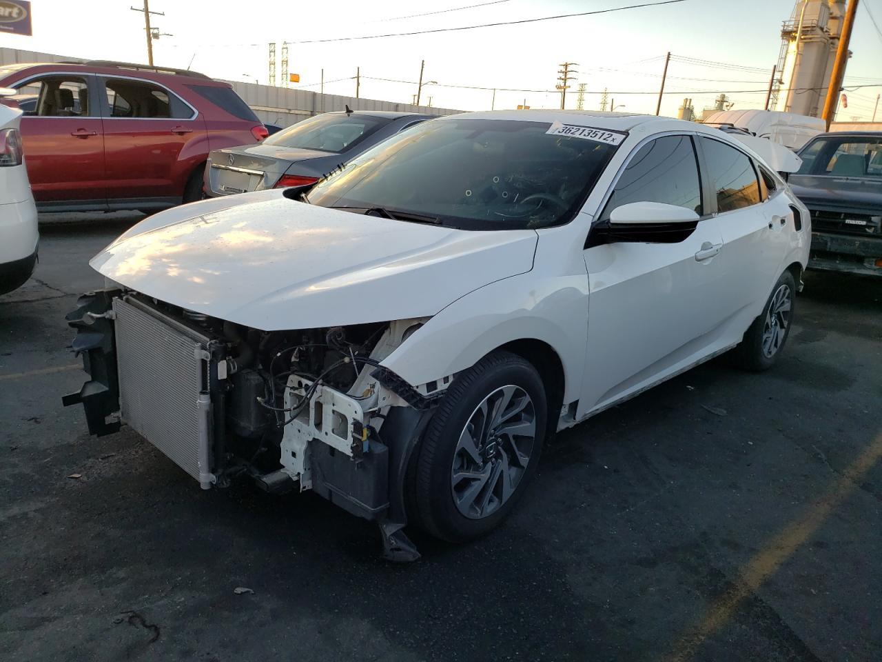 Photo 2 from auction – 2018 HONDA CIVIC EX with VIN 2HGFC2F76JH542932