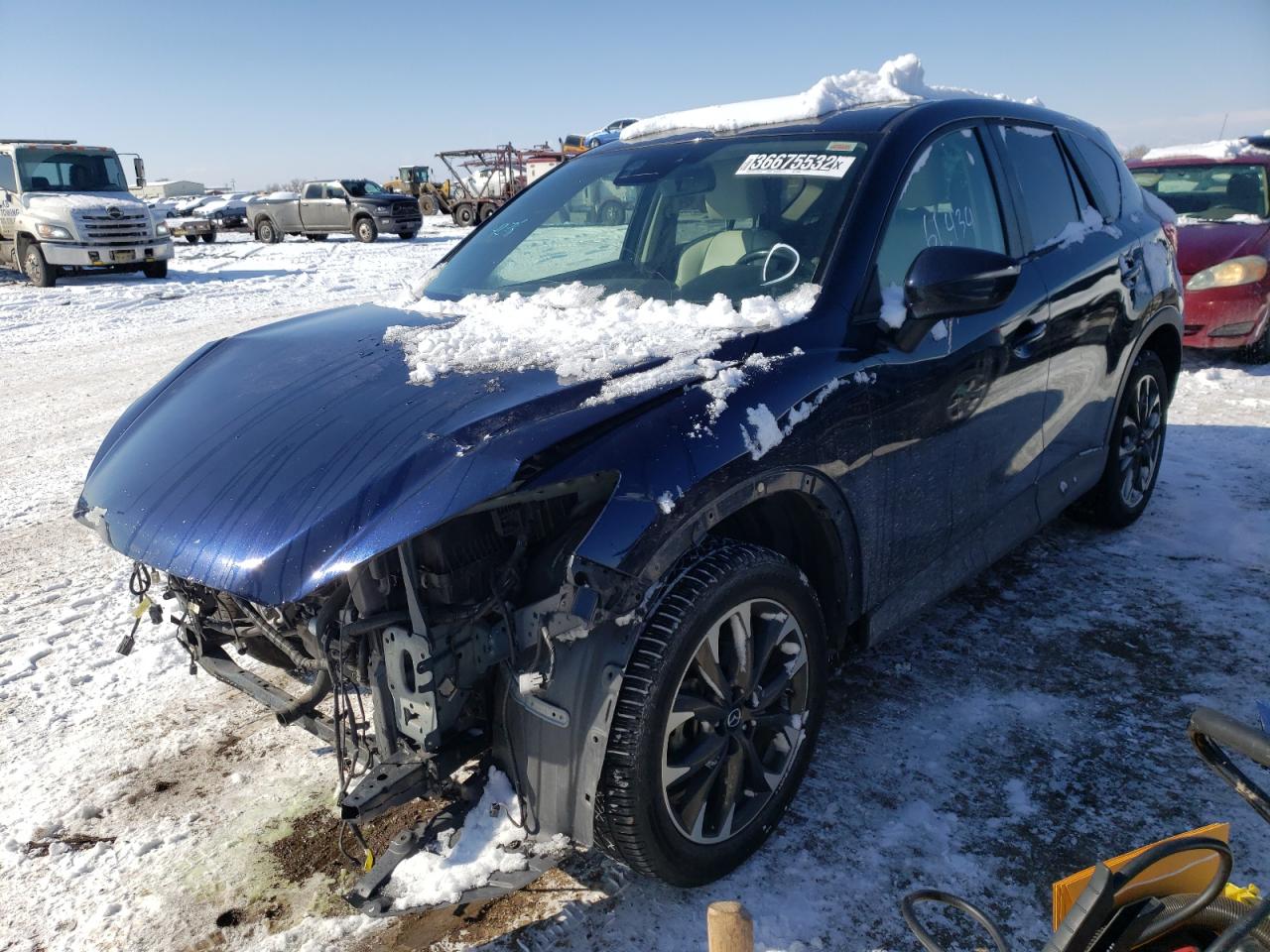 Photo 2 from auction – 2016 MAZDA CX-5 GT with VIN JM3KE2DYXG0728268