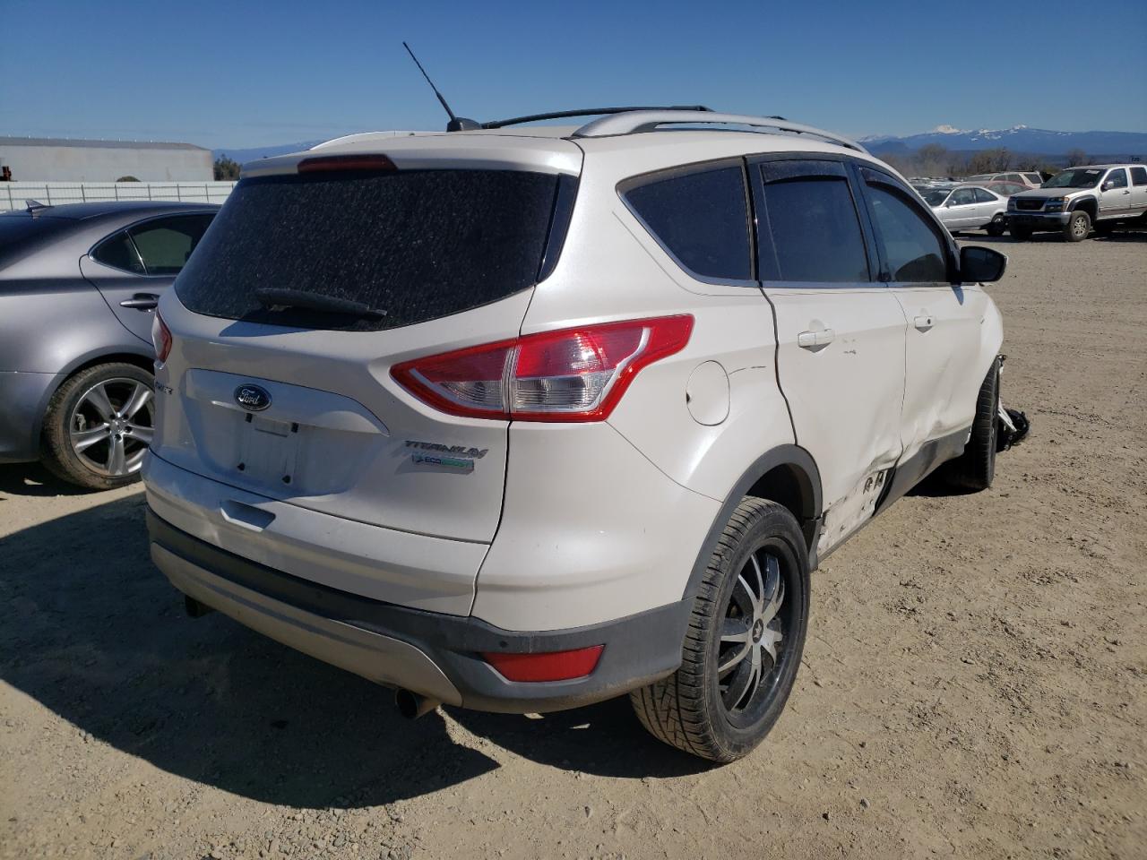 Photo 4 from auction – 2013 FORD ESCAPE TIT with VIN 1FMCU0J90DUA53273