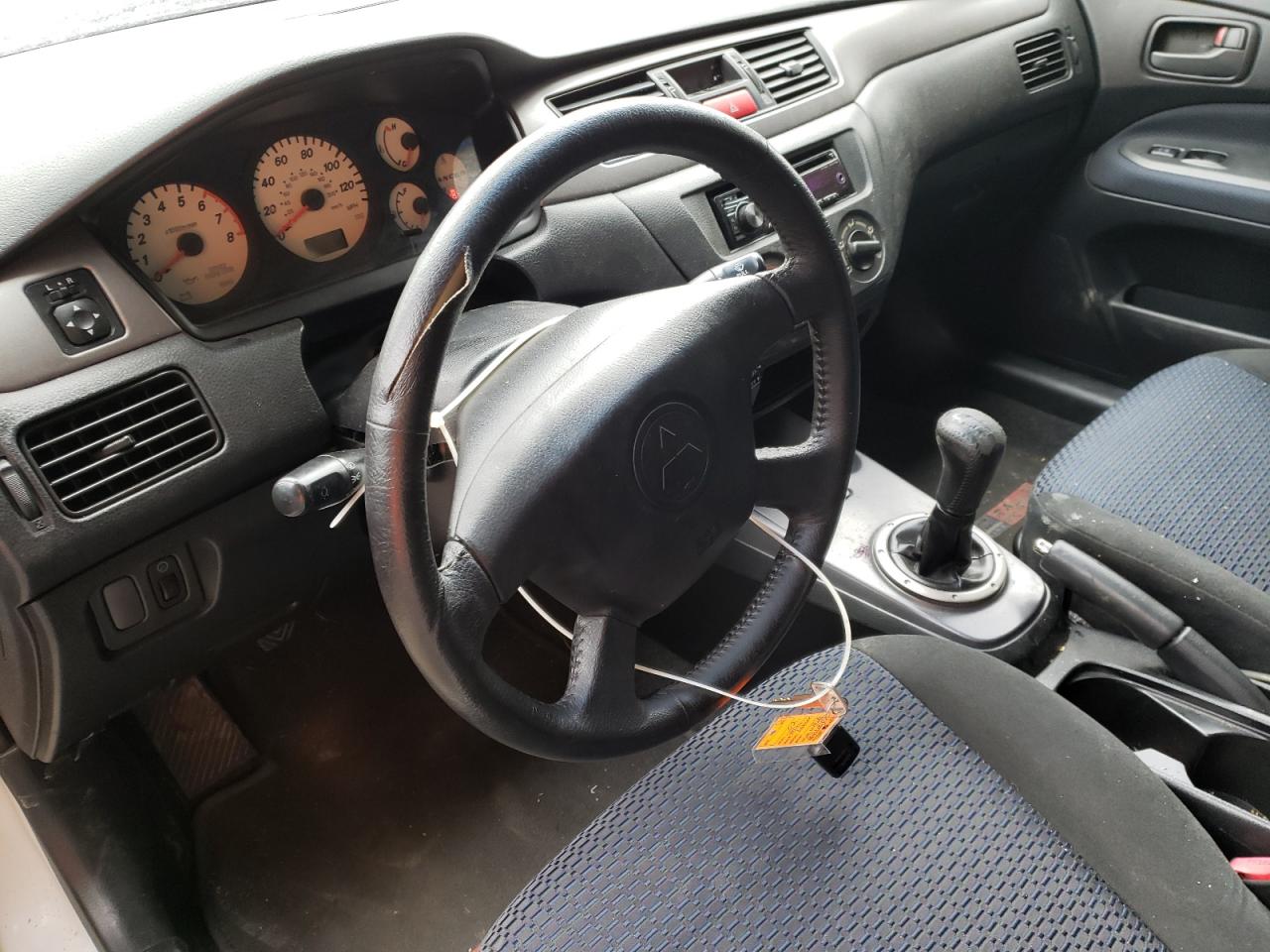 Photo 9 from auction – 2002 MITSUBISHI LANCER OZ with VIN JA3AJ86E82U031249
