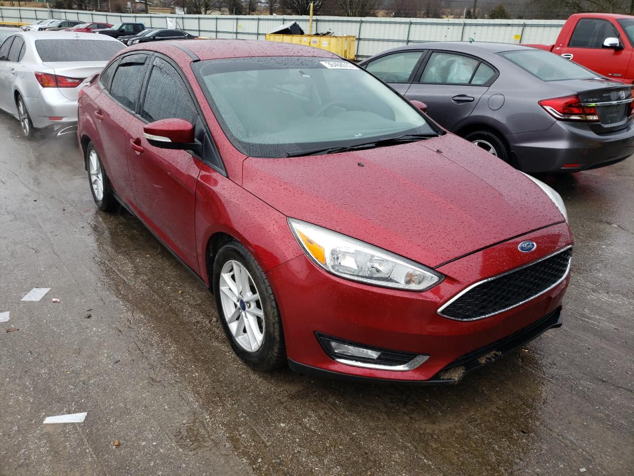 FORD FOCUS SE 2015 with VIN 1FADP3F24FL259112 - Photo from auction