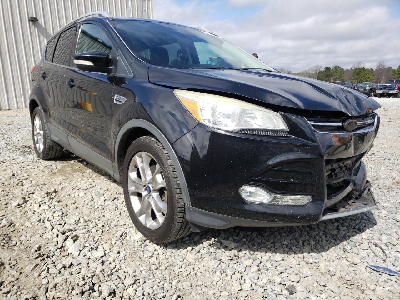 FORD ESCAPE TIT 2014 with VIN 1FMCU0JX0EUD42220 - Photo from auction