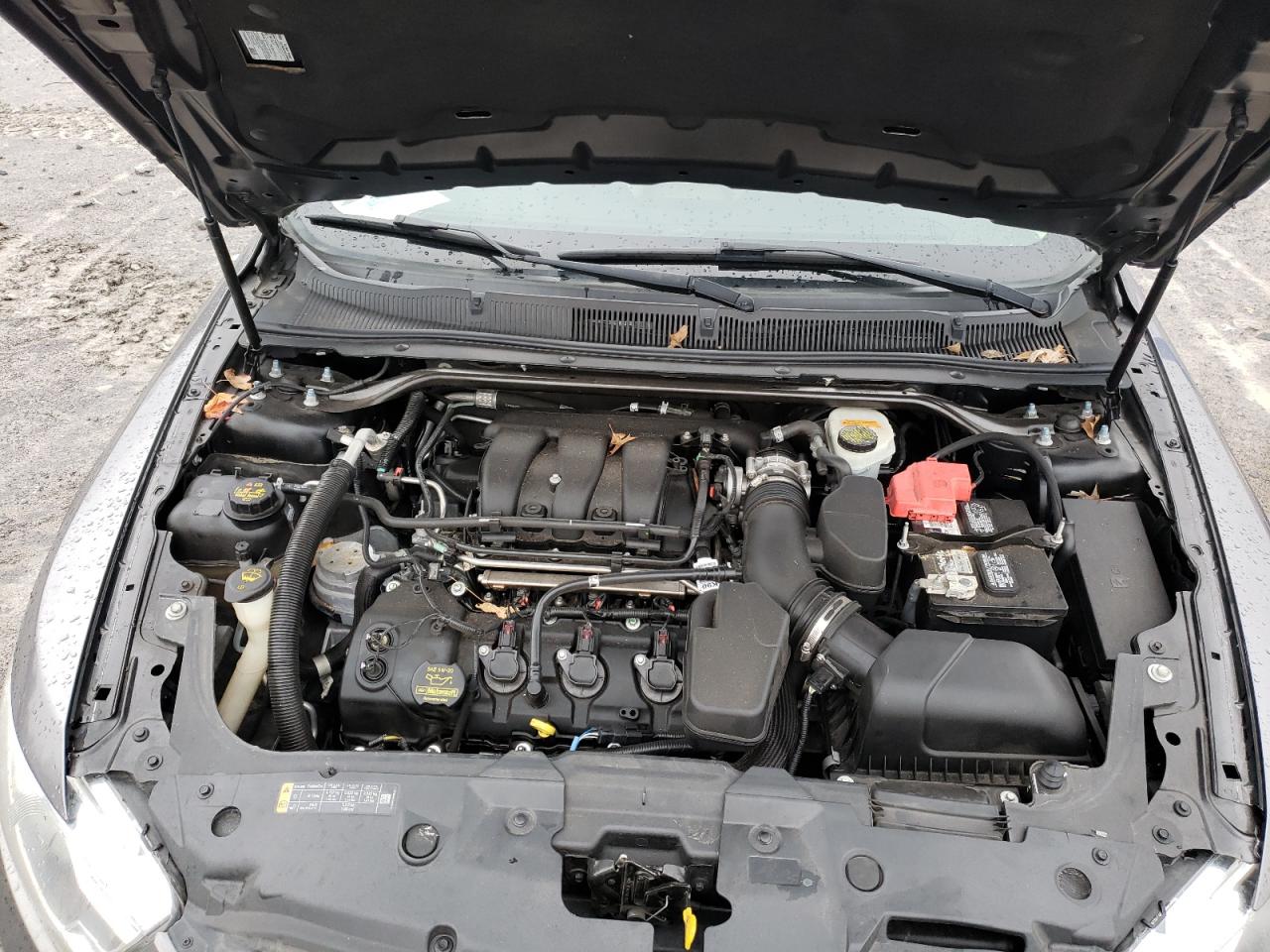 Photo 7 from auction – 2014 FORD TAURUS SEL with VIN 1FAHP2E83EG130514