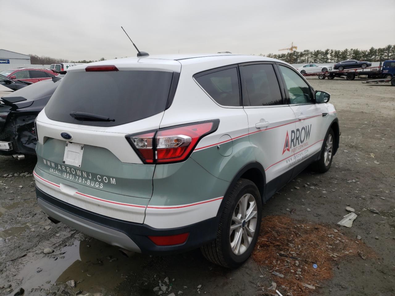 Photo 4 from auction – 2017 FORD ESCAPE SE with VIN 1FMCU9G94HUD03051