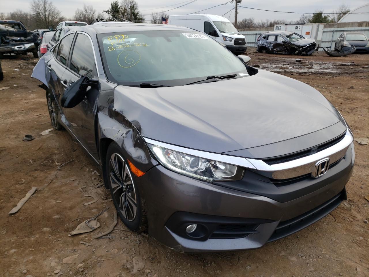 HONDA CIVIC EX 2018 with VIN JHMFC1F36JX041541 - Photo from auction