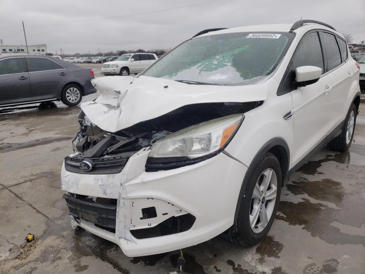 Photo 2 from auction – 2014 FORD ESCAPE SE with VIN 1FMCU0GX0EUB28657