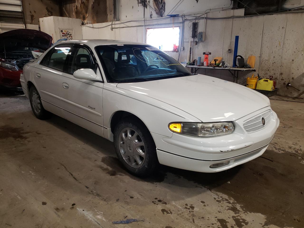 BUICK REGAL LS 1999 with VIN 2G4WB52K3X1519571 - Photo from auction