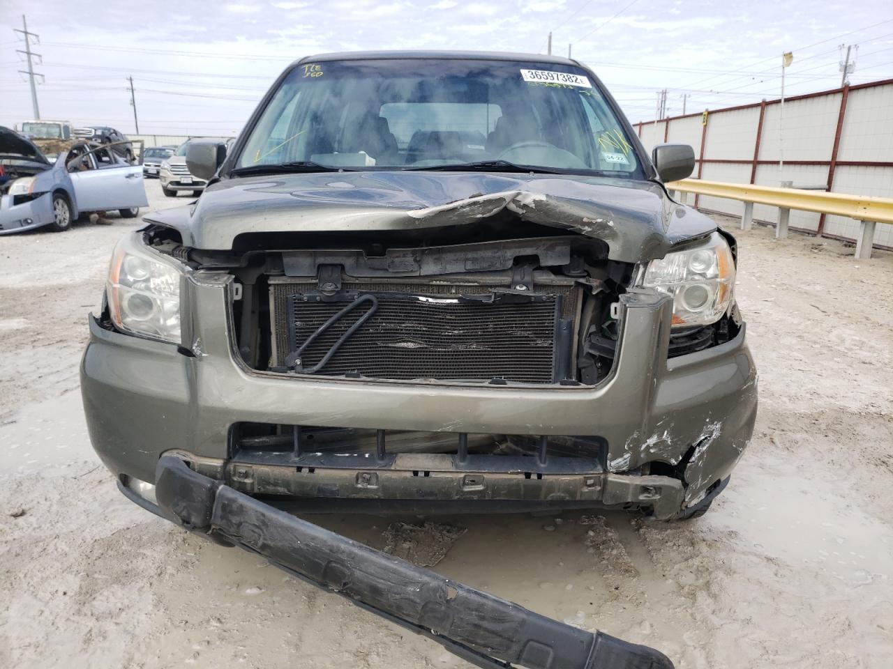Photo 9 from auction – 2006 HONDA PILOT EX with VIN 5FNYF28456B036572