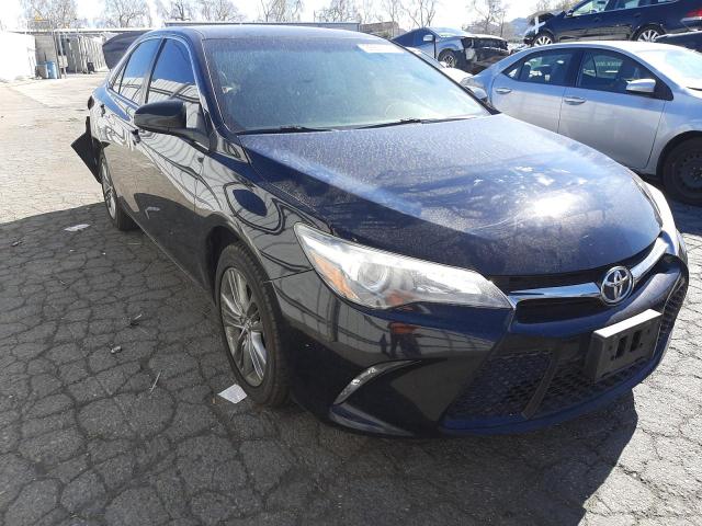 TOYOTA CAMRY LE 2017 with VIN 4T1BF1FK7HU388463 - Photo from auction