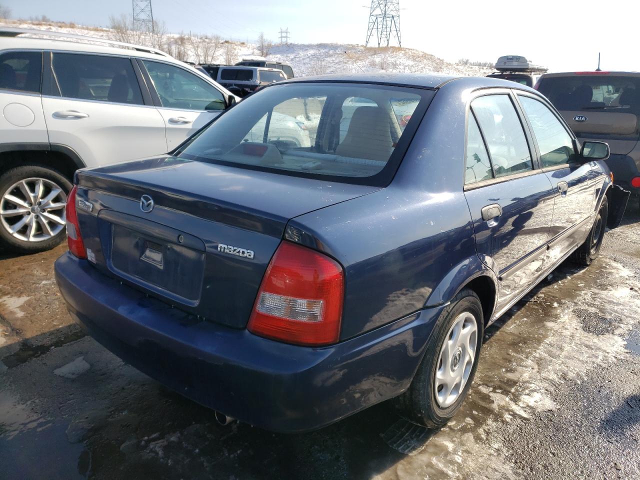 Photo 4 from auction – 2000 MAZDA PROTEGE DX with VIN JM1BJ2224Y0296085