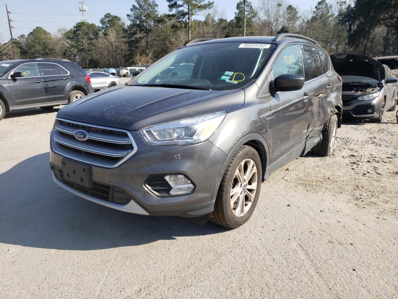 Photo 2 from auction – 2017 FORD ESCAPE SE with VIN 1FMCU0GD9HUD73497
