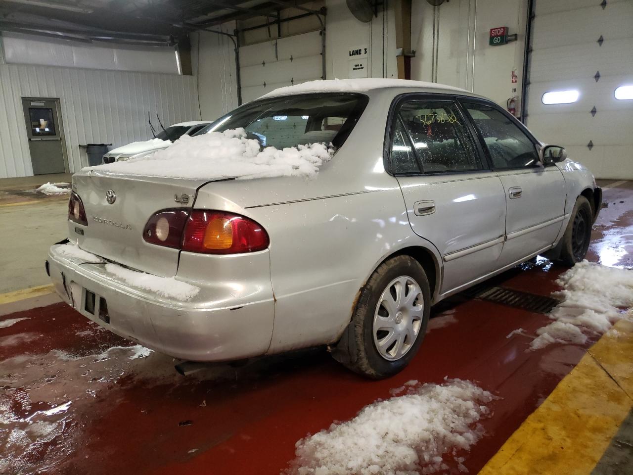 Photo 4 from auction – 2001 TOYOTA COROLLA CE with VIN 2T1BR12E31C512940