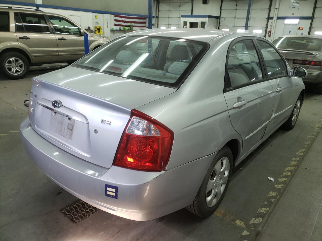 Photo 4 from auction – 2004 KIA SPECTRA LX with VIN KNAFE121345041381