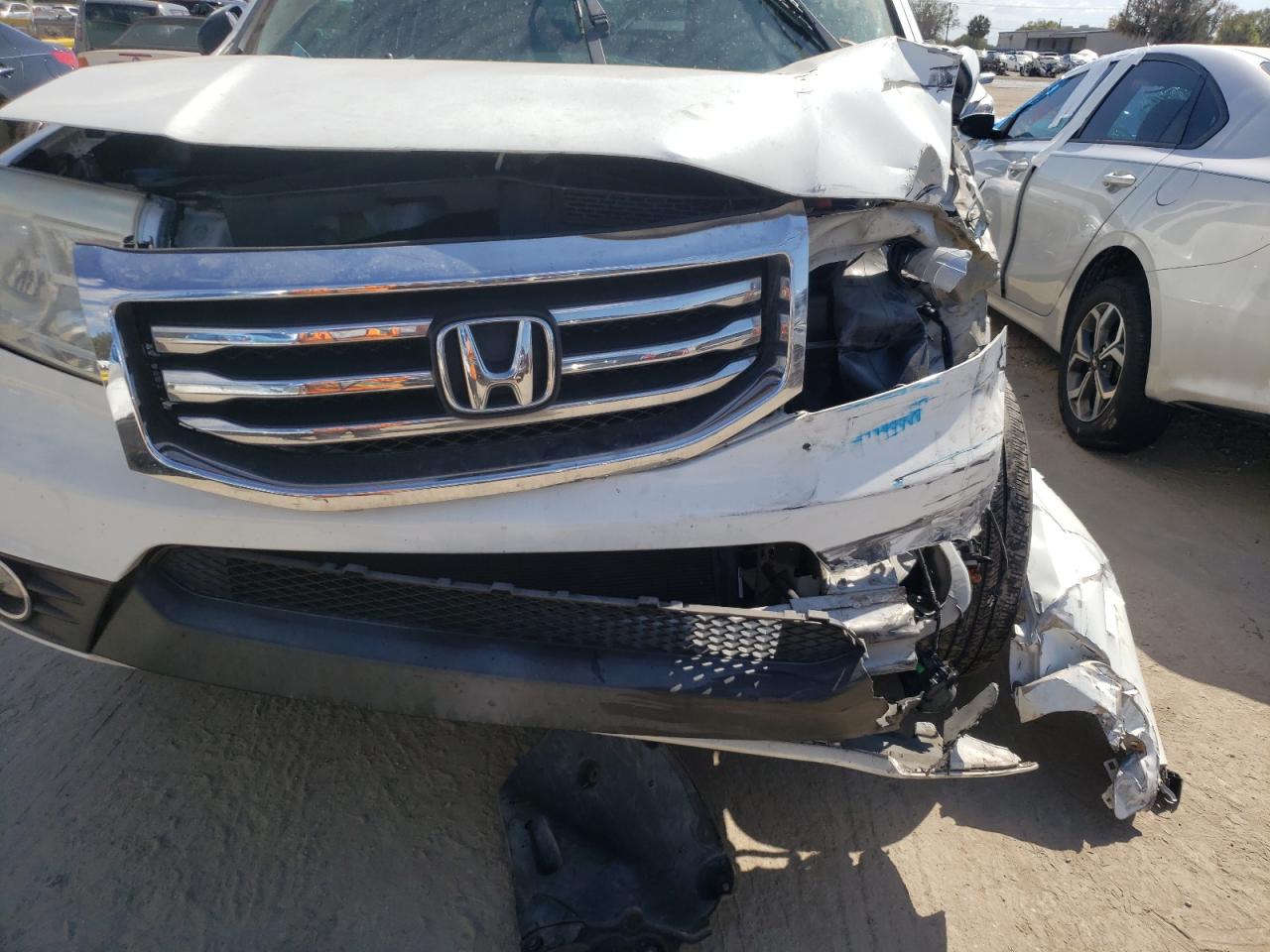 Foto 9 de la subasta – 2014 HONDA PILOT EXL con VIN 5FNYF3H50EB007543
