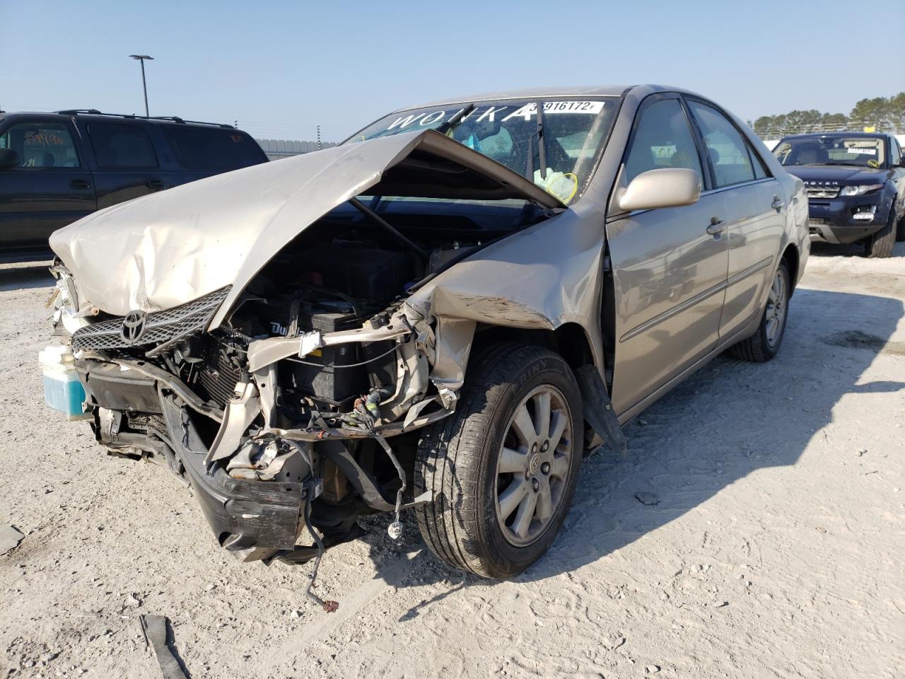 Photo 2 from auction – 2002 TOYOTA CAMRY LE with VIN 4T1BE32K42U615247