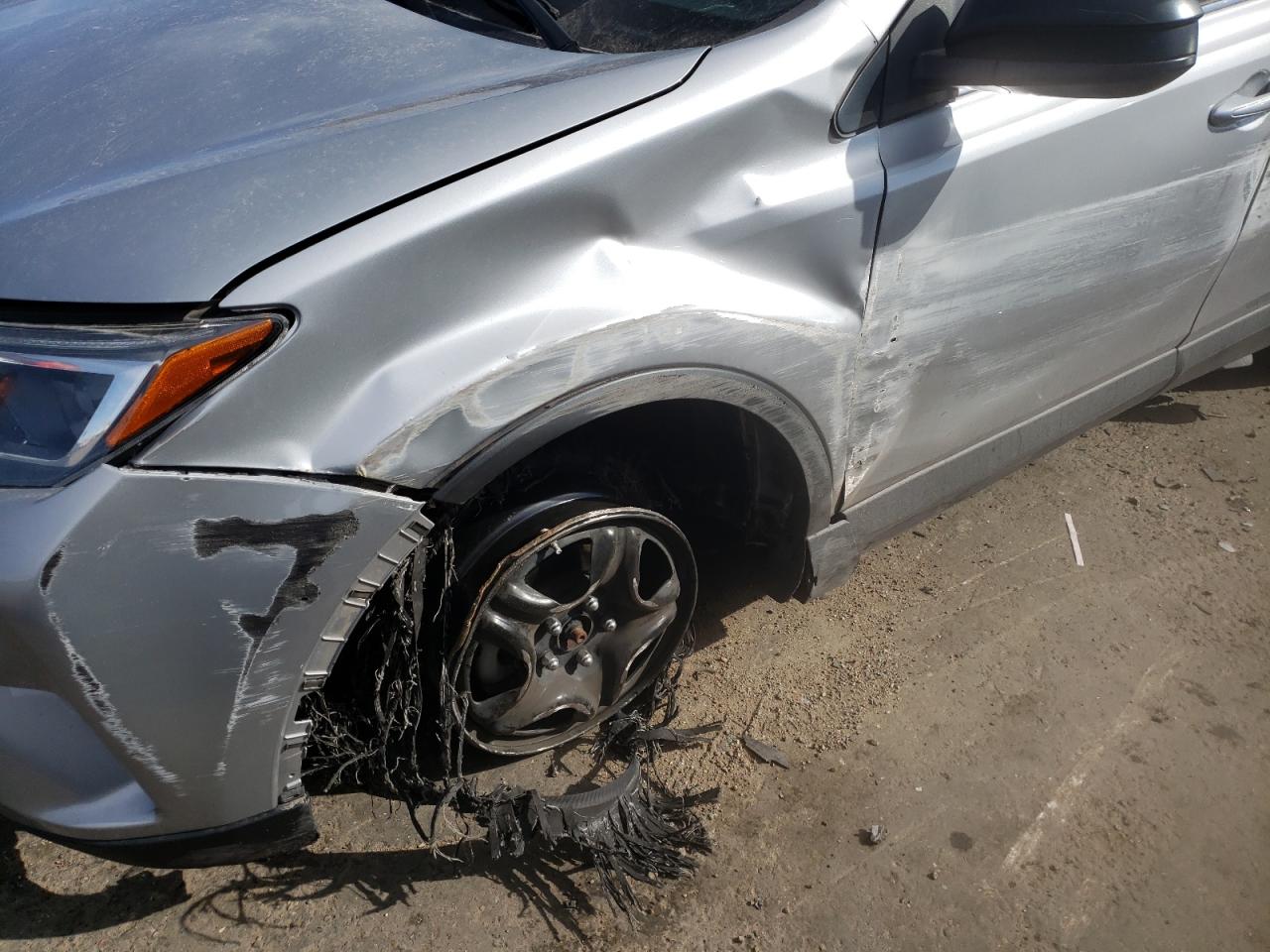 Photo 9 from auction – 2018 TOYOTA RAV4 LE with VIN 2T3BFREV9JW760778