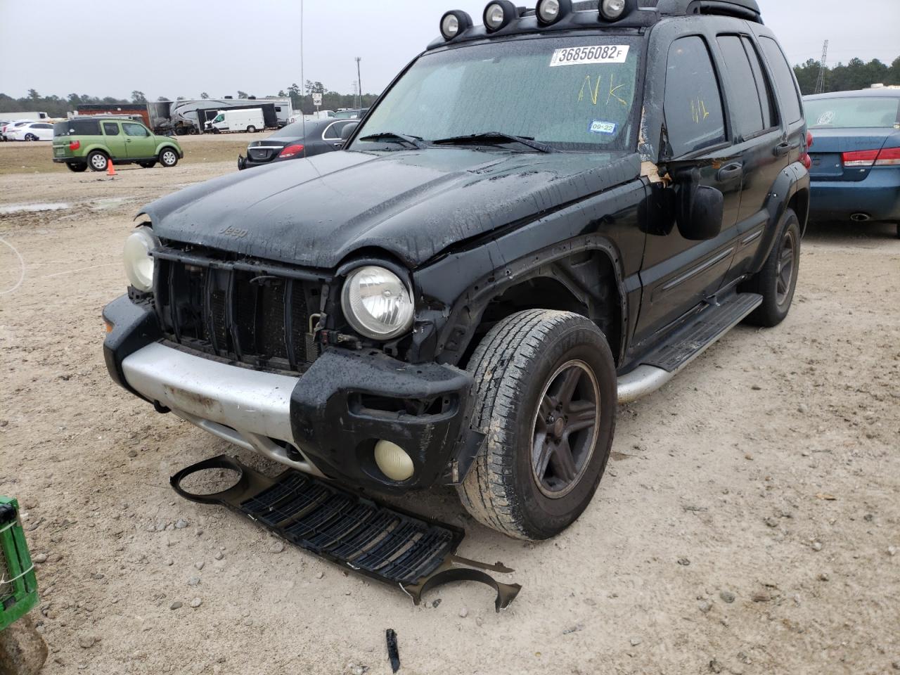 Photo 9 from auction – 2003 JEEP LIBERTY RE with VIN 1J4GL38K83W567713