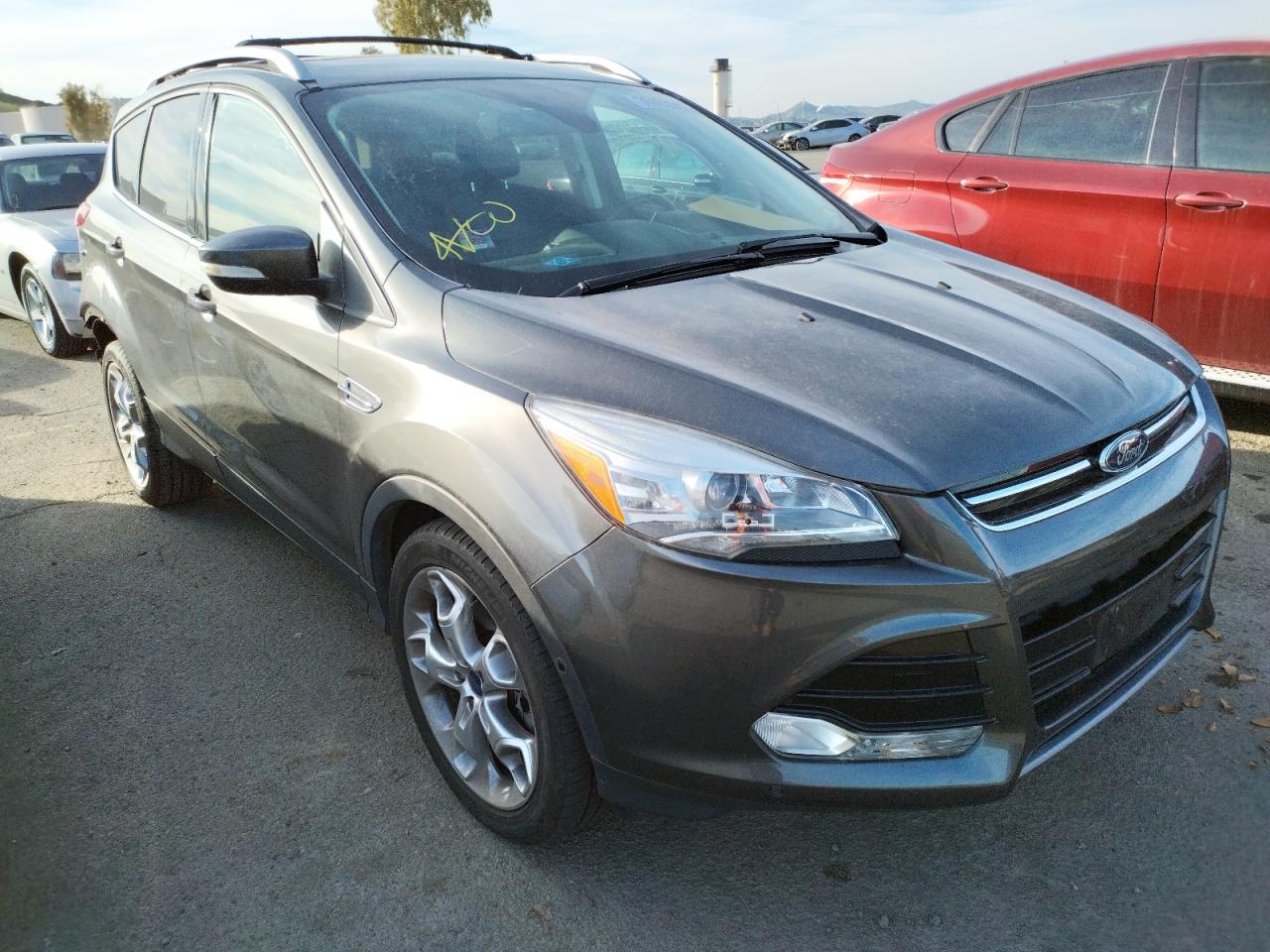 FORD ESCAPE TIT 2016 with VIN 1FMCU0J9XGUA40079 - Photo from auction