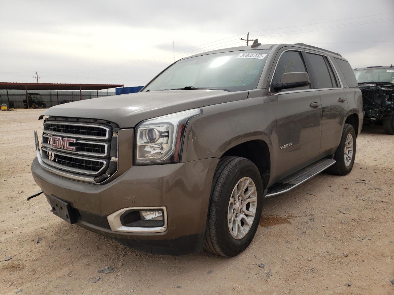 Photo 2 from auction – 2015 GMC YUKON SLE with VIN 1GKS2AKC5FR675254