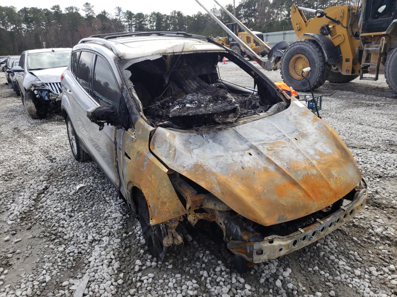 FORD ESCAPE TIT 2014 with VIN 1FMCU0J9XEUB38557 - Photo from auction