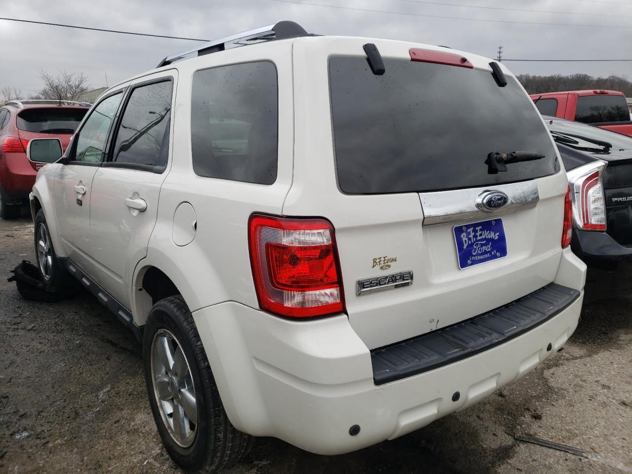 Photo 3 from auction – 2009 FORD ESCAPE LIM with VIN 1FMCU04G69KD11776