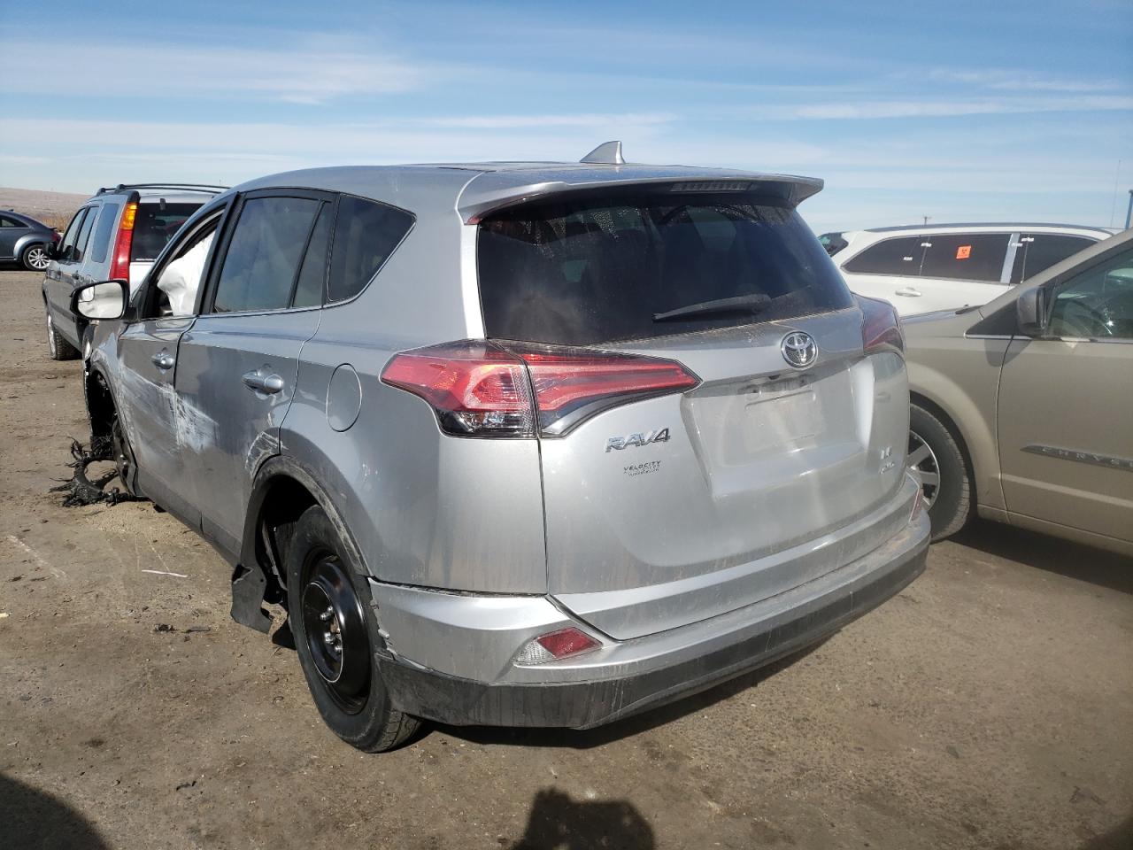 Photo 3 from auction – 2018 TOYOTA RAV4 LE with VIN 2T3BFREV9JW760778
