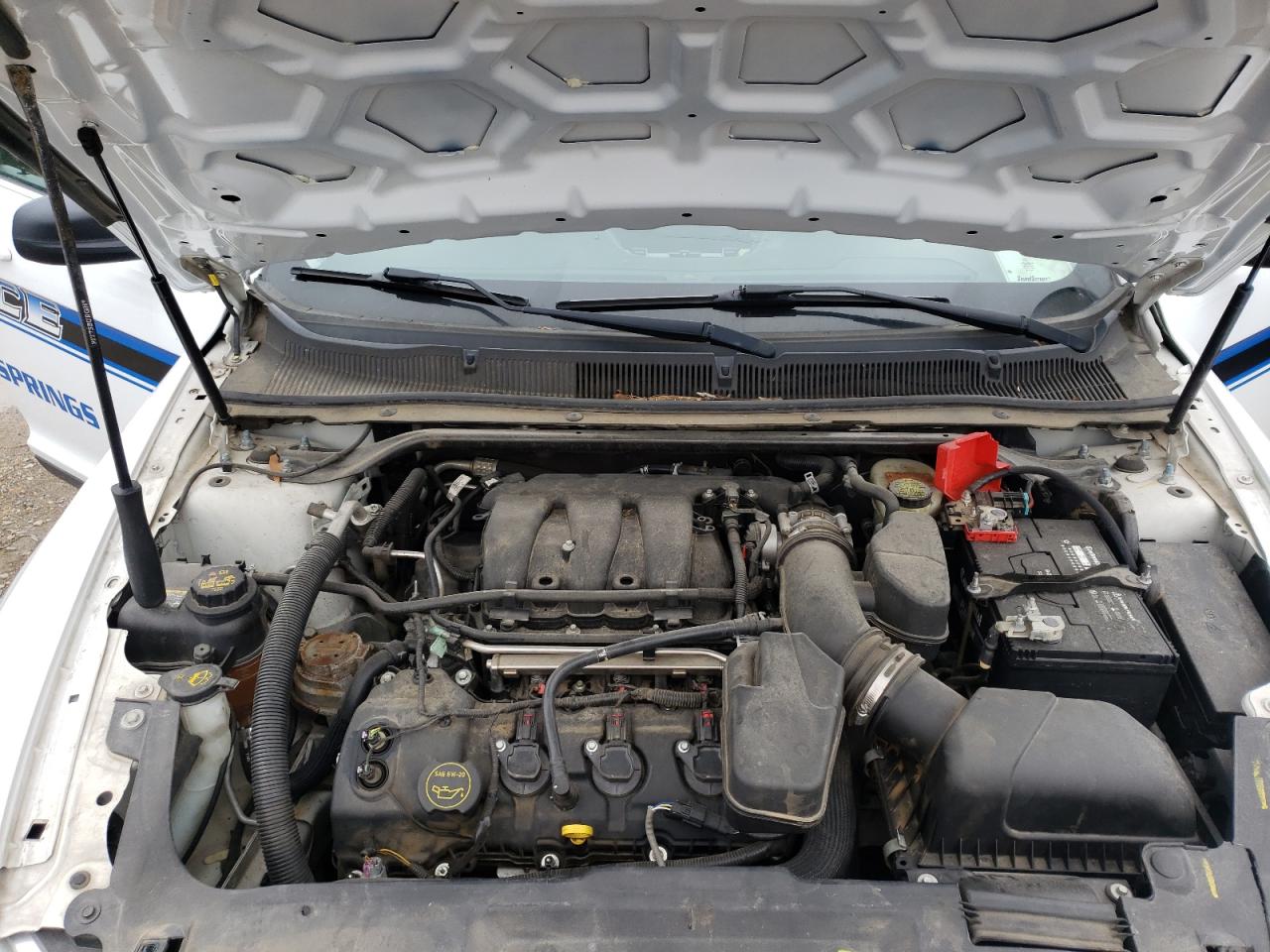 Photo 7 from auction – 2016 FORD TAURUS POL with VIN 1FAHP2MK5GG138498