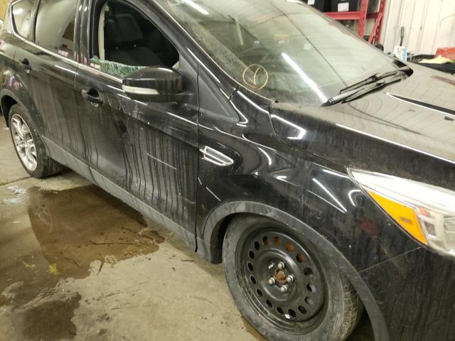 Photo 9 from auction – 2016 FORD ESCAPE TIT with VIN 1FMCU9J92GUA53283