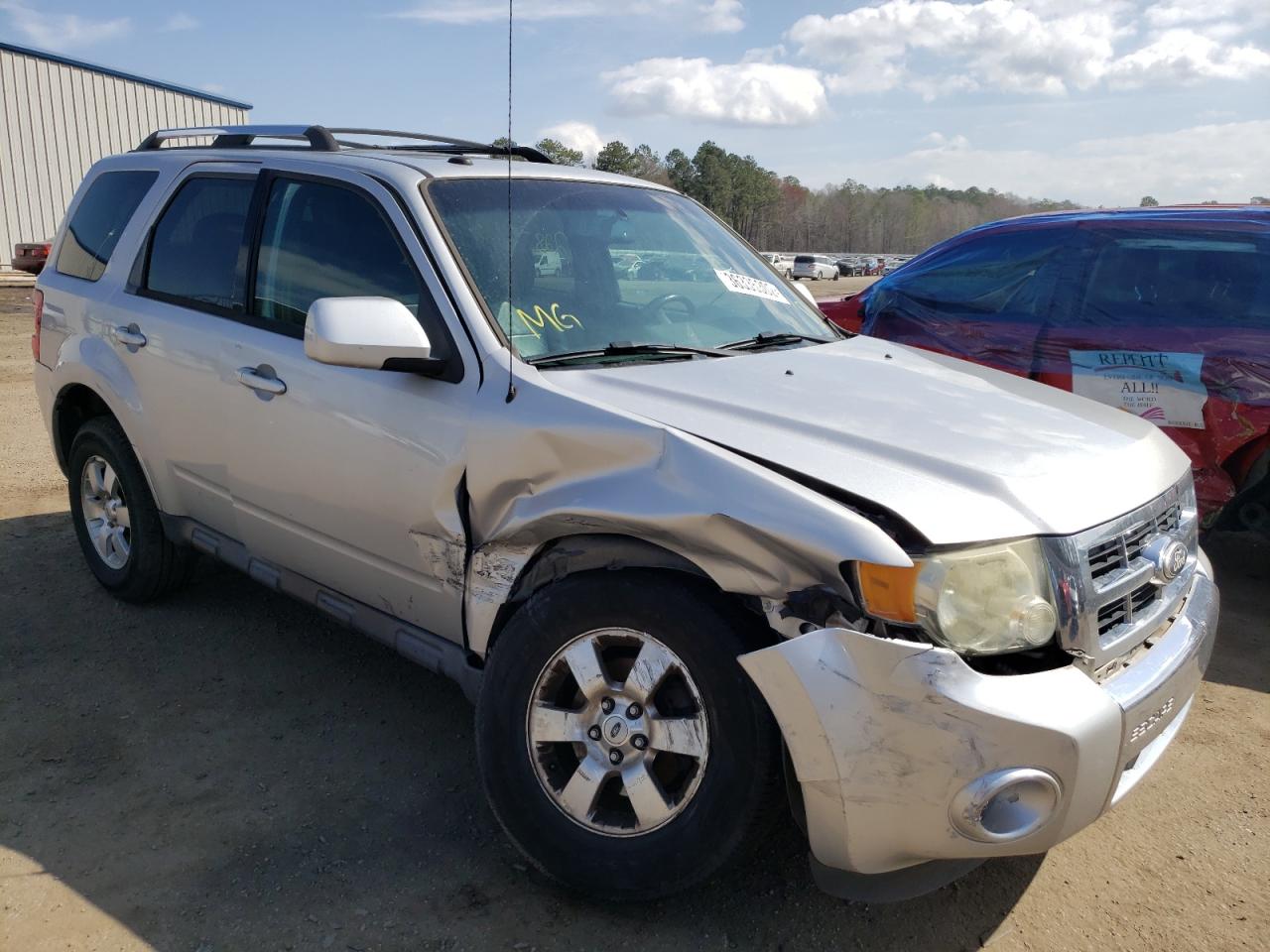 Photo 9 from auction – 2011 FORD ESCAPE LIM with VIN 1FMCU0EG7BKB84962