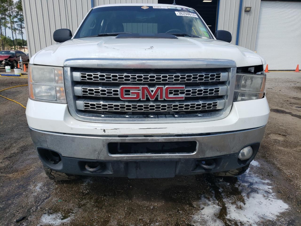 Photo 9 from auction – 2014 GMC SIERRA K25 with VIN 1GT120C89EF102000