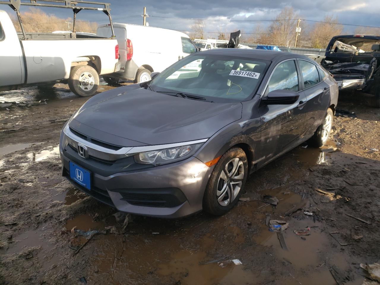 Photo 2 from auction – 2016 HONDA CIVIC LX with VIN 19XFC2F57GE048225