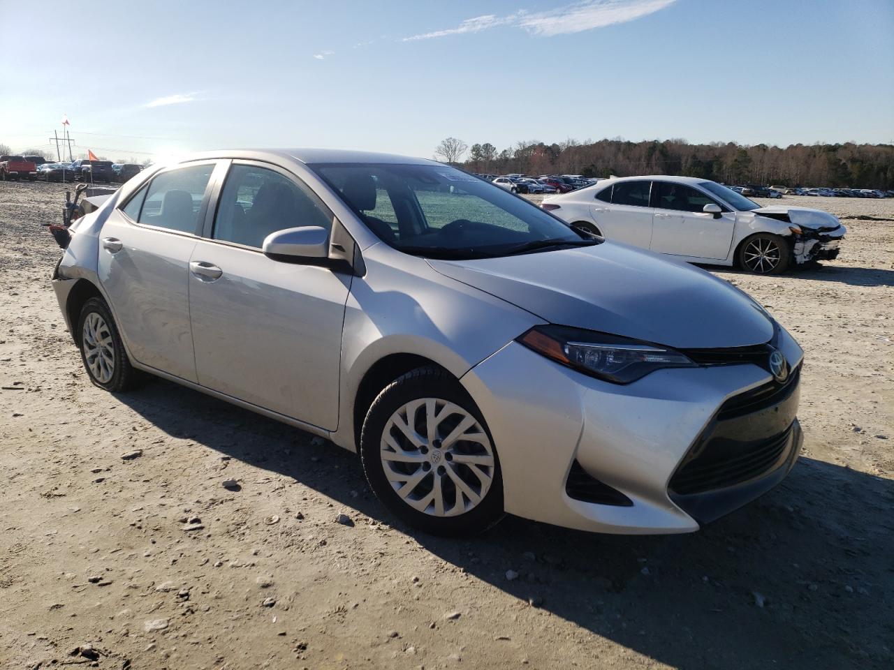 TOYOTA COROLLA L 2017 with VIN 5YFBURHE9HP702594 - Photo from auction