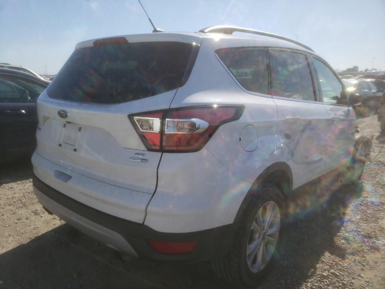 Photo 4 from auction – 2017 FORD ESCAPE SE with VIN 1FMCU9GD5HUE98405